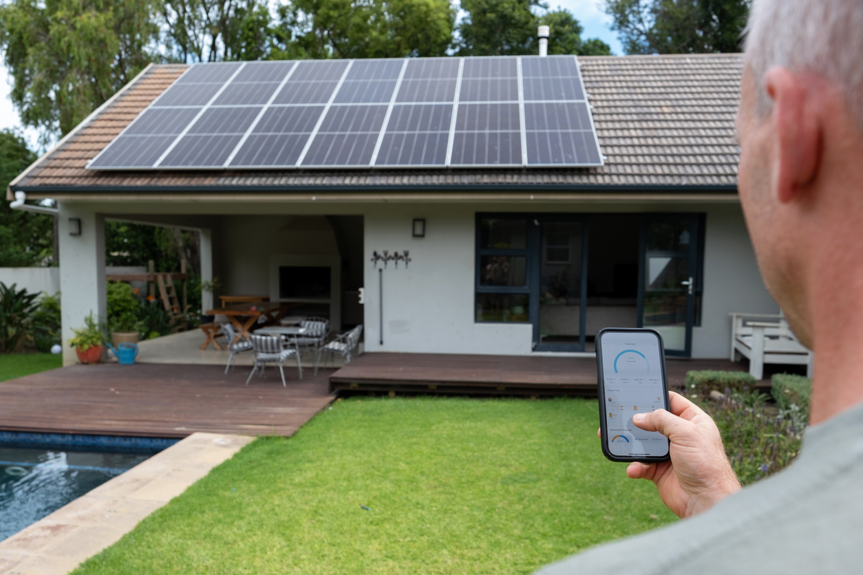 Homeowner monitoring their solar and battery system